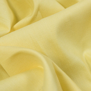 Yellow fabric with a slight pattern on it