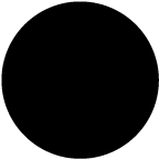 A man that is standing in the dark with a cell phone