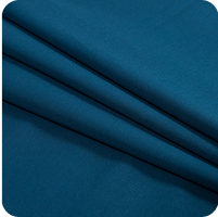 A close up of a blue fabric with a black background