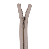 A close up of a zipper with a metal zipper pull