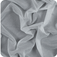 A close up of a white cloth with a black background