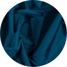 A close up of a blue cloth with a black background